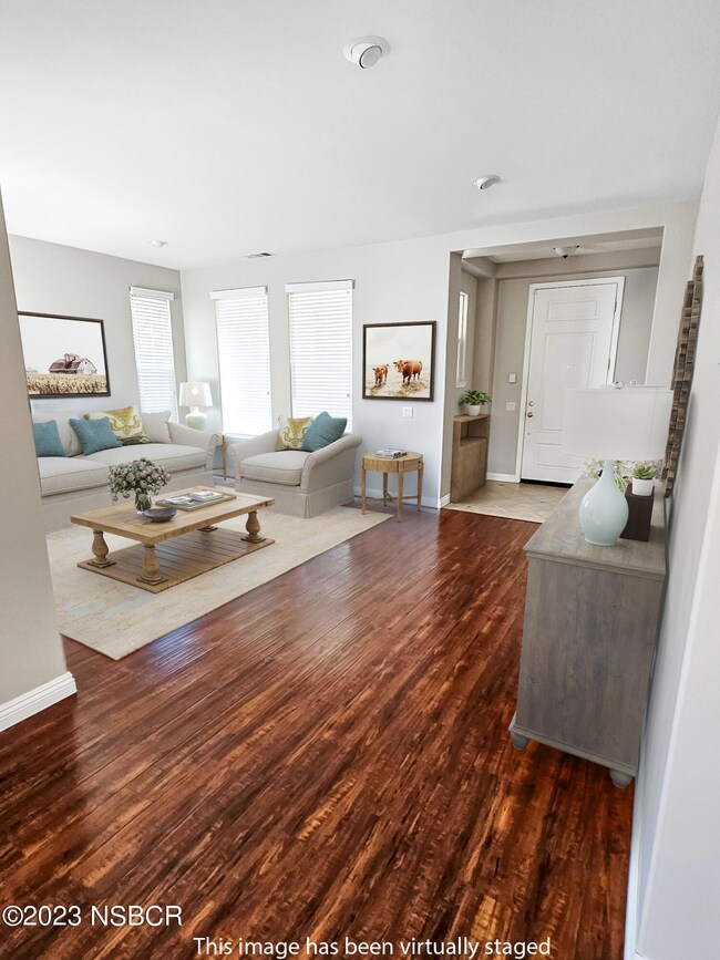 LIVING ROOM AND FOYER