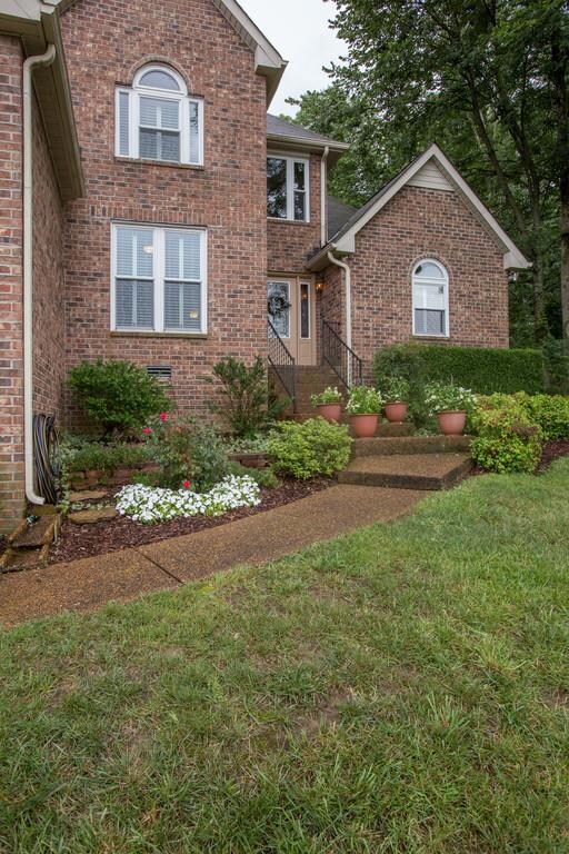 The entry has a recently replaced front door.