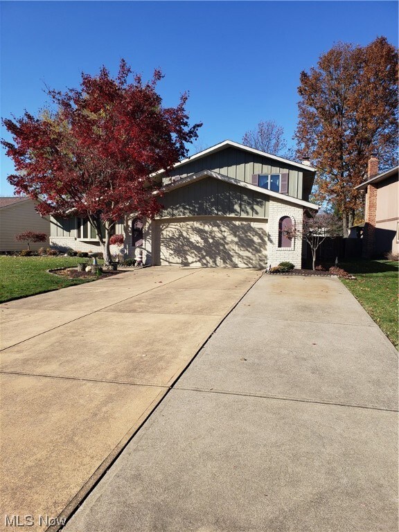 View of front of property with a garage