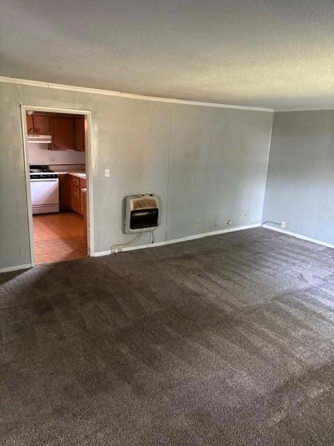Spacious living room with carpet, textured walls a