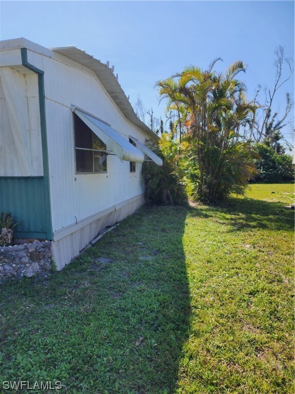 5449 Rainbow Dr, Bokeelia, FL 33922 - photo 5