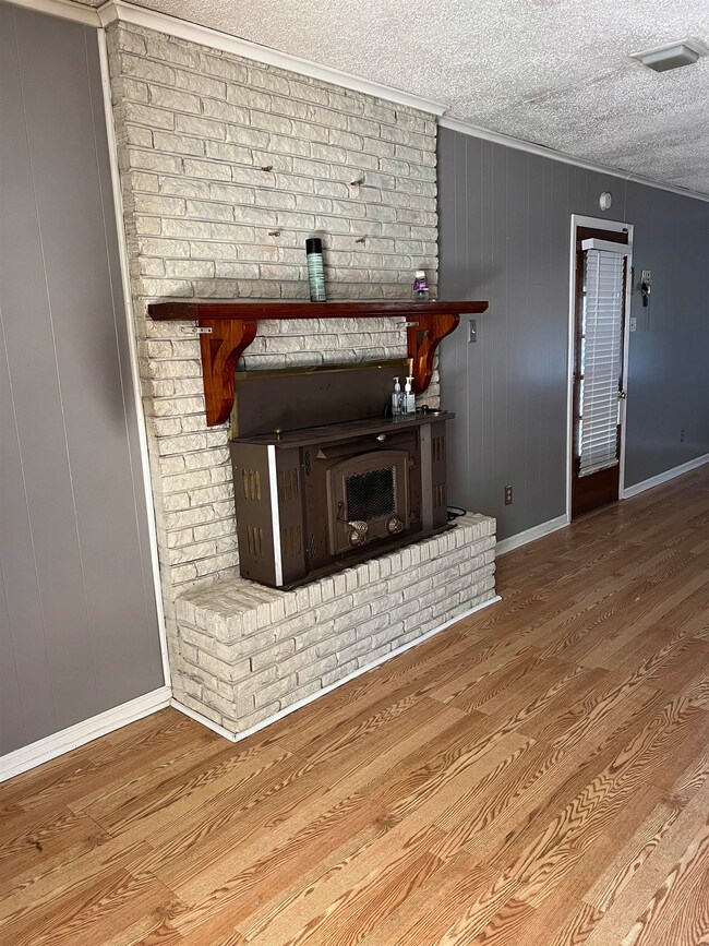 Details featuring hardwood / wood-style floors, wo