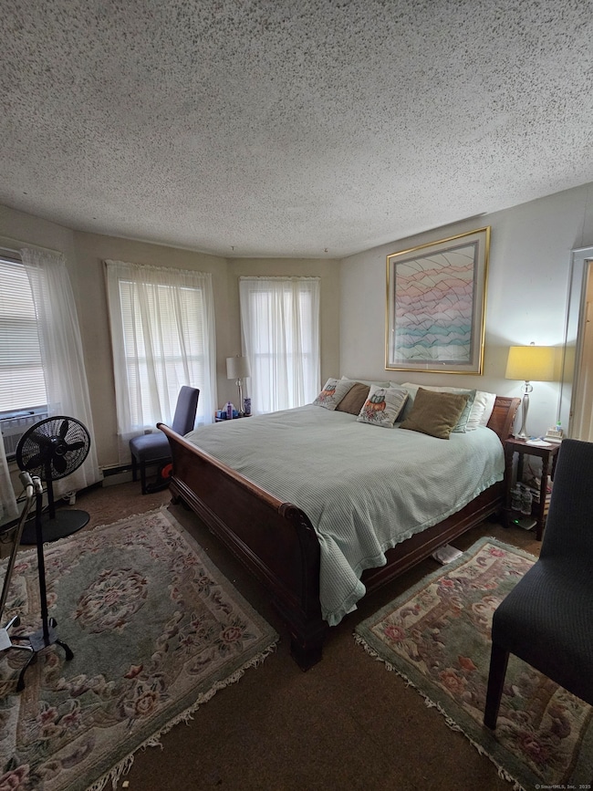 The first floor offers 3 bedrooms and 2 bathrooms, not all pictured.