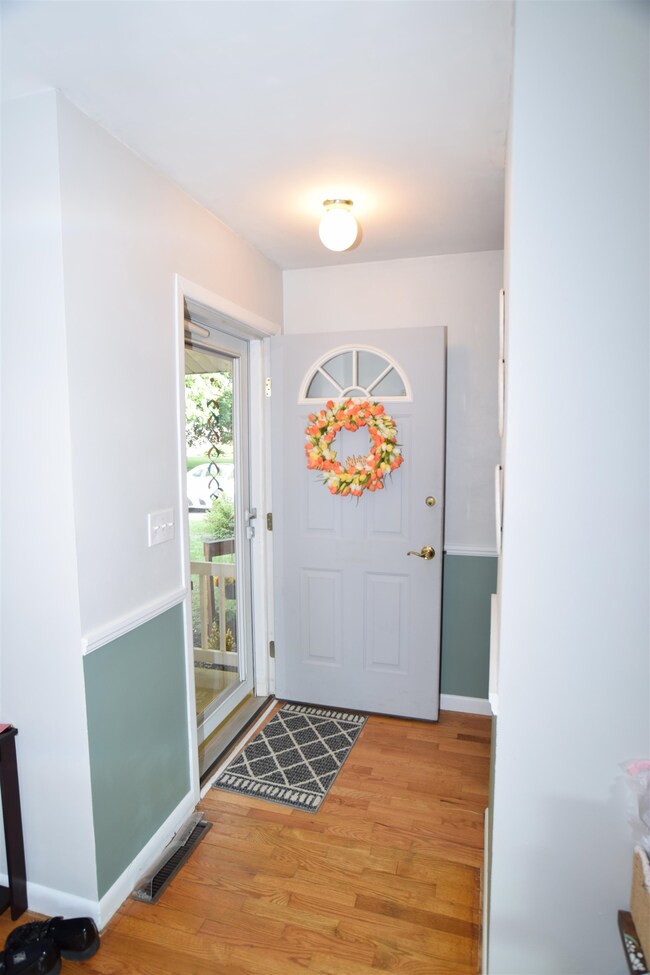 The front entry welcome you into the main living spaces.
