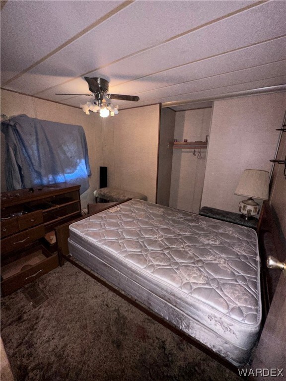 Bedroom featuring a ceiling fan