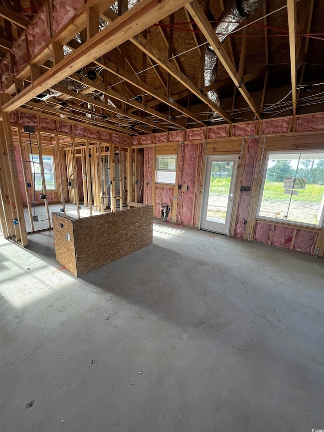 Misc room featuring healthy amount of natural light