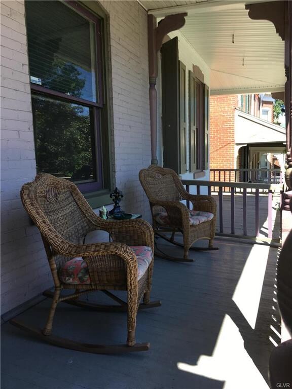 Rock away your cares on the covered front porch