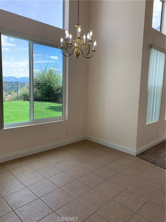 Formal Dine with New Window and Vaulted Ceilings