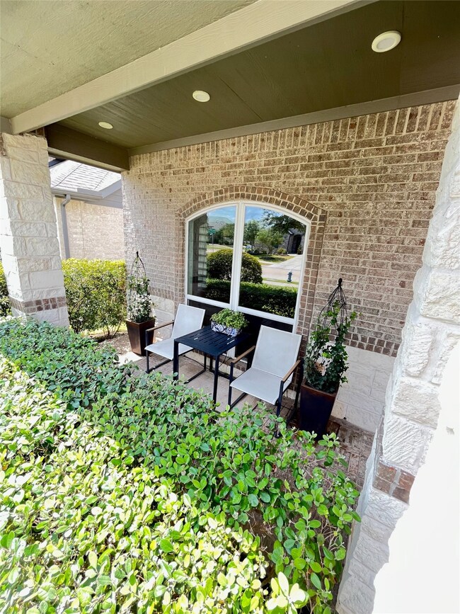 Upgraded front elevation includes porch with room