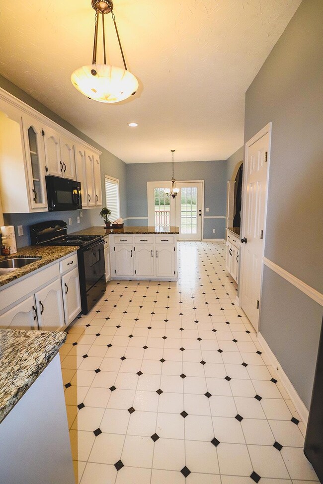 Charming kitchen with built in pantry and an 