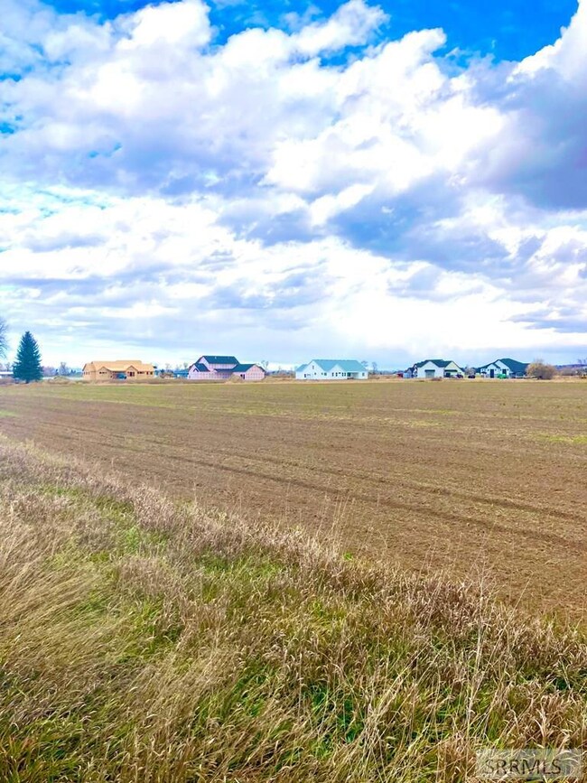 Lot is on the left of photo. New homes being built