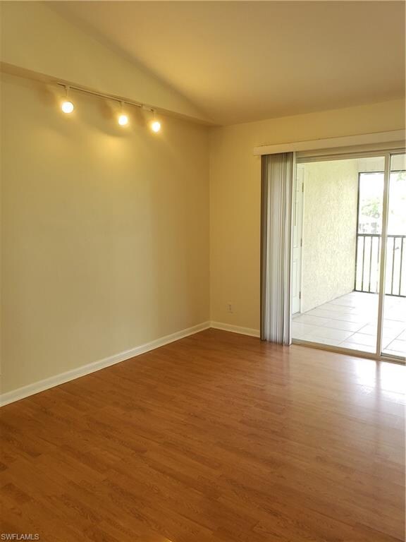 Large eat in kitchen with sliding door access to s
