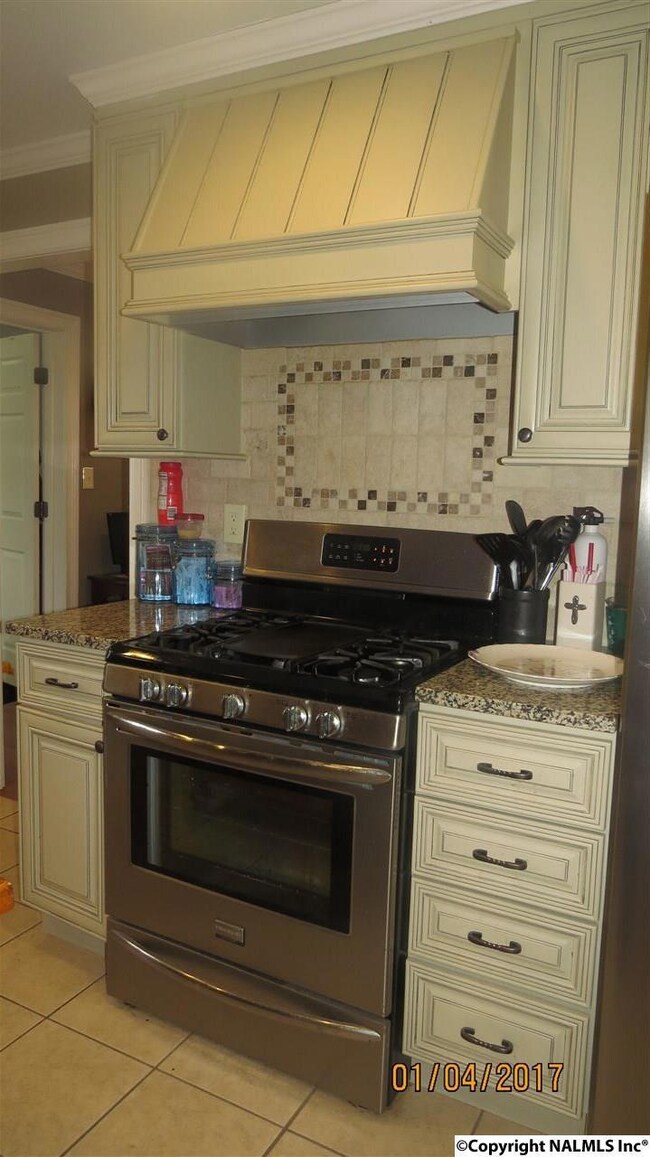 Gas stove with tile backsplash