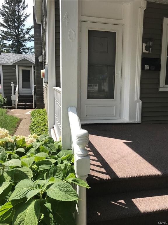SIDE DOOR THAT OPENS INTO THE KITCHEN