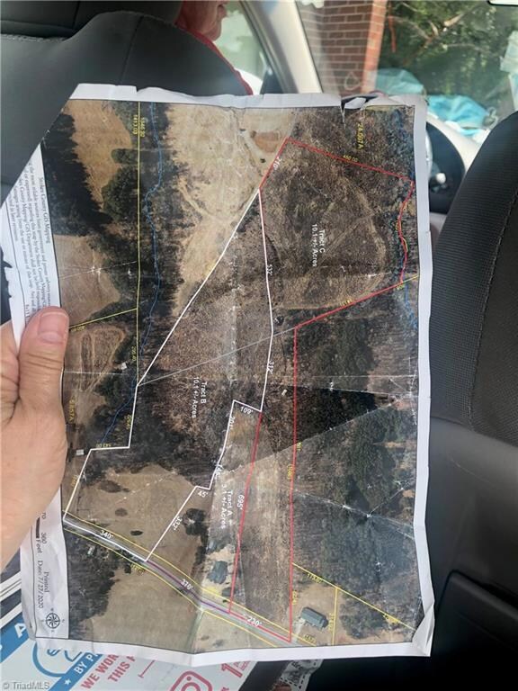This shows the seller's idea of dividing the lot.  Outlined in white is approximately 10 acres and outlined in red is approximately 10 acres. The old Home place in the front middle is not being sold