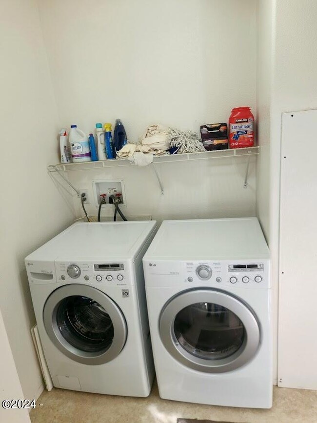 Gas dryer and electric washer
