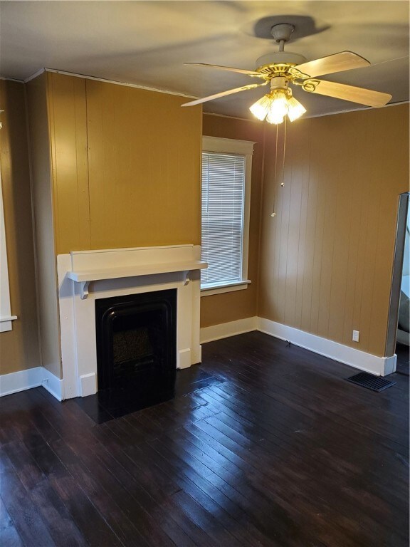 Left unit living room with decorative fireplace