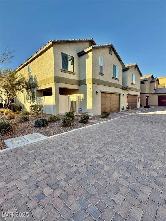 View of front of home featuring an attached garage