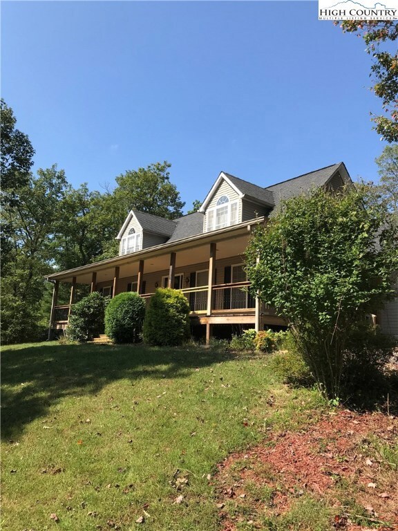 Full length covered rocking chair porch runs the f