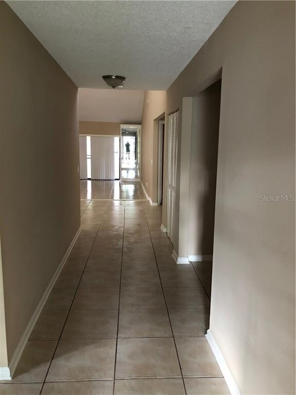 ENTRANCE HALLWAY LOOKING AT DINNING/LIVING ROOM AR