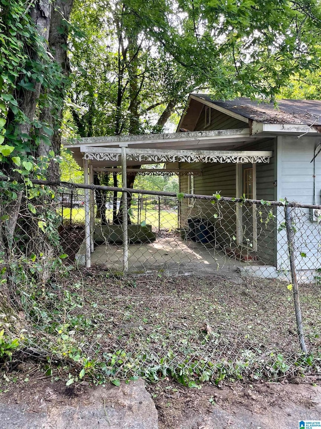 Access carport from back alley.