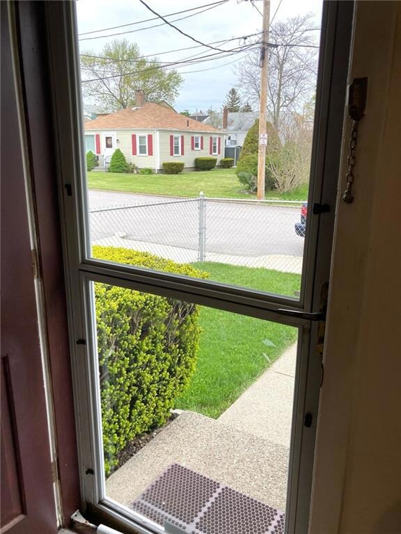 Entering the front storm door with a view of one o