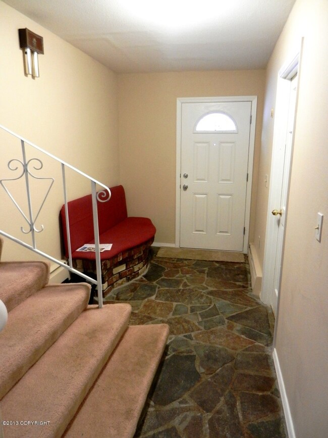 Front Entry w/gorgeous stone flooring