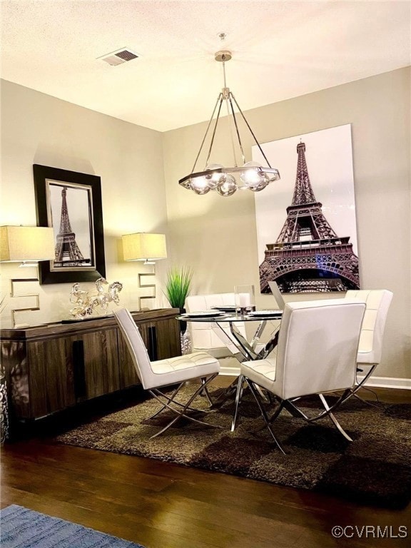 Dining room featuring wood finished floors