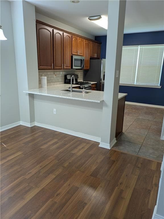View of kitchen showing overlapping countertop.