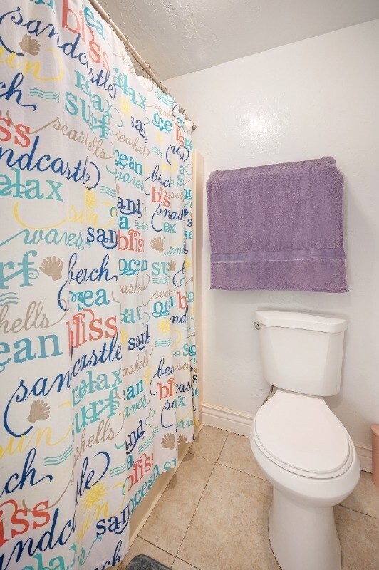 A full shower/tub combination located in this separate section of the bathroom