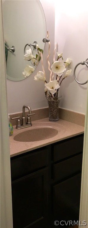 Half bathroom off of foyer entrance