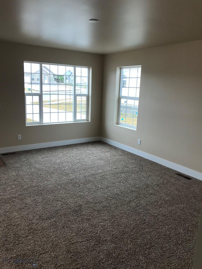 Living room. Photo of similar home.