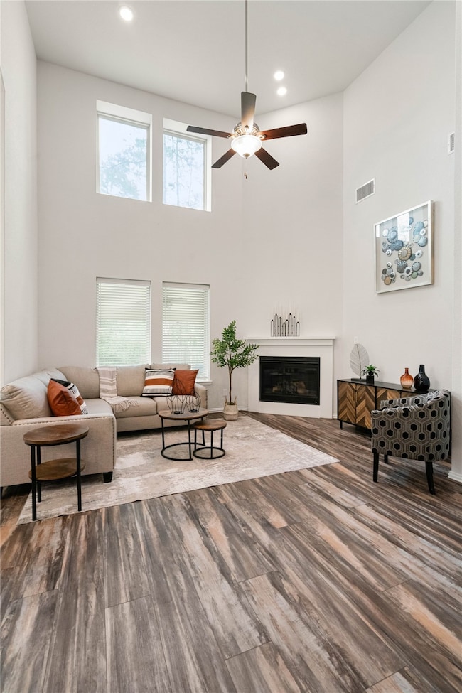 Living room featuring two story ceiling and beauti