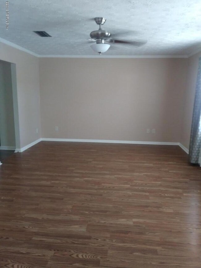 10609 Bolyard Dr, Jacksonville, FL 32218 - photo 4