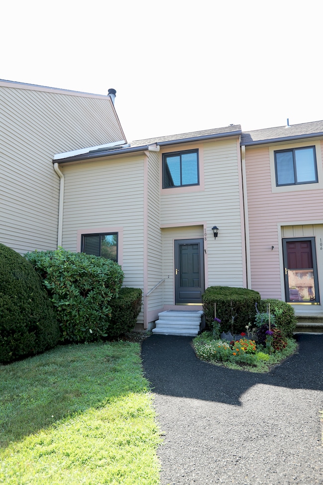 Lovely landscaping and brand new front steps!