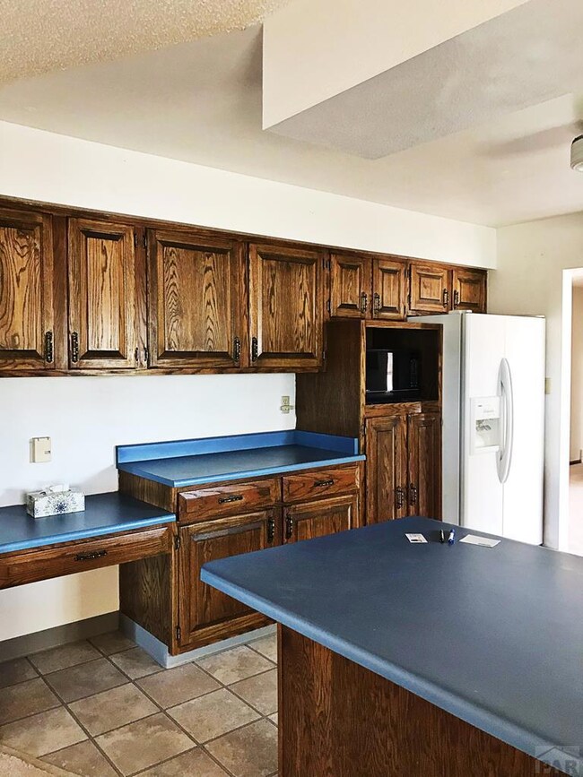 Kitchen built in desk/side by side refrigerator