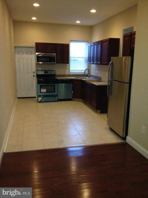 1617 N Caroline St, Baltimore, MD 21213 - photo 7