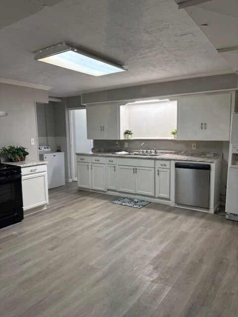 Huge kitchen area with plenty of cabinet storage.