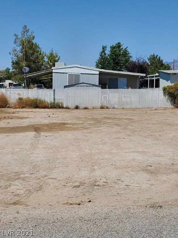 Facing North to back of property