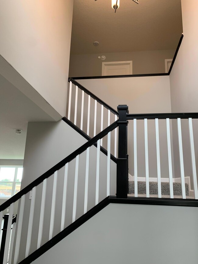 Welcome home!  The main entry is a beautiful two foyer. Model home.