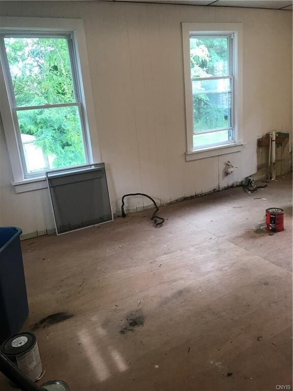 spacious kitchen with windows overlooking the back