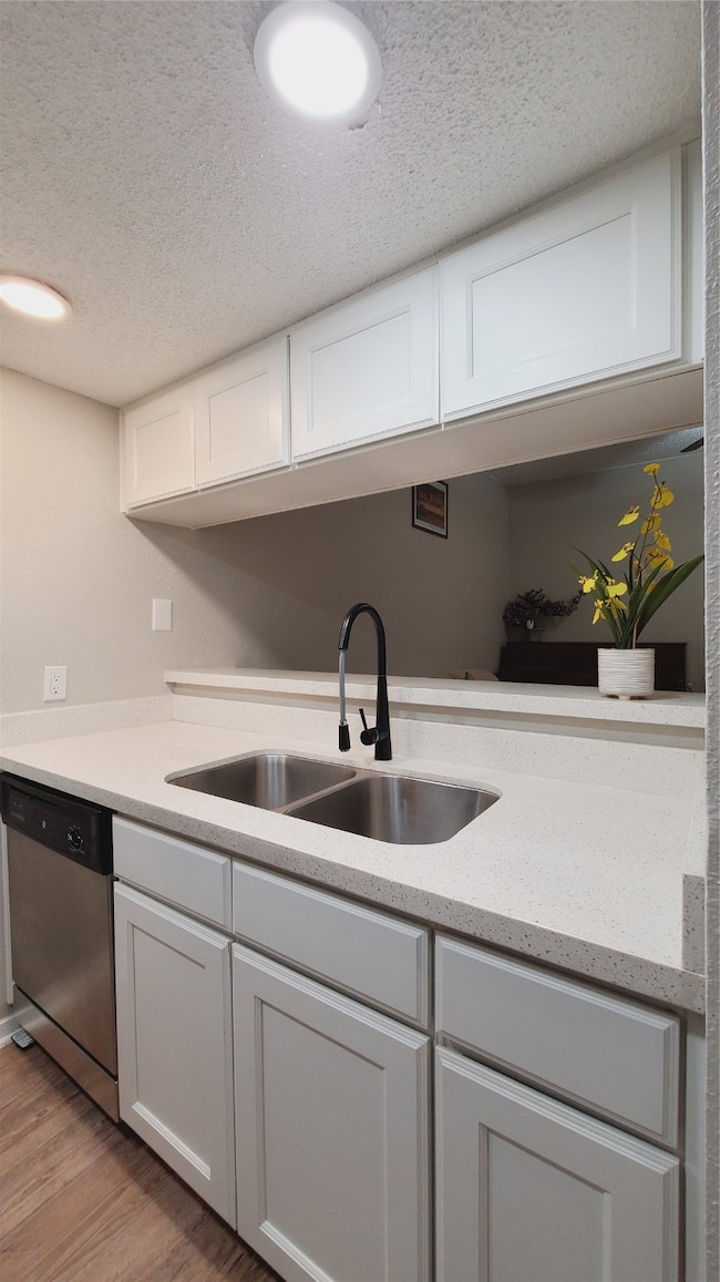 Updated kitchen with new finishes; refrigerator stays with the home.