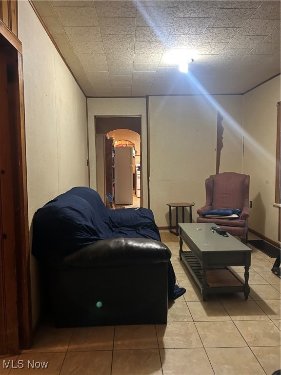 Sitting room featuring light tile patterned floors