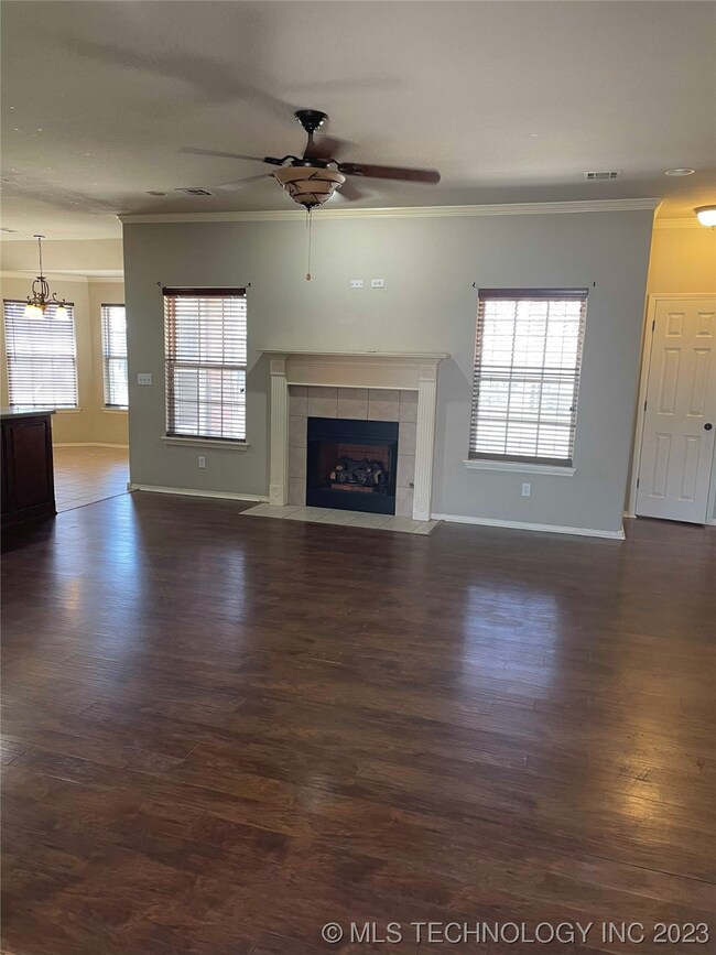 Living room view to open kitchen layout