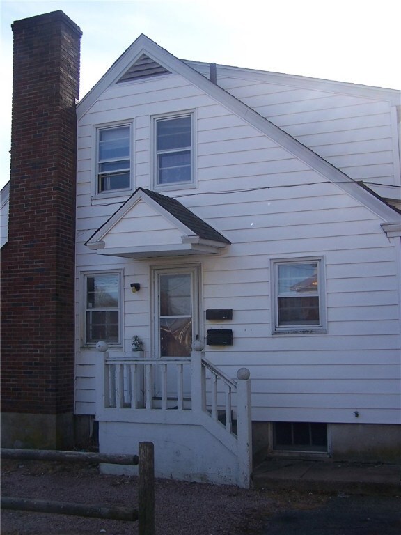 Side view.  Entrance to the second floor apartment