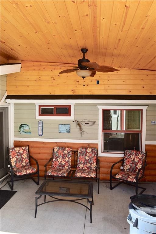 Covered rear patio and even a ceiling fan!
