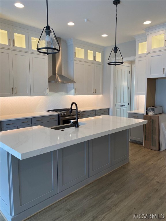 Kitchen with stacked cabinets touching 10' ceiling