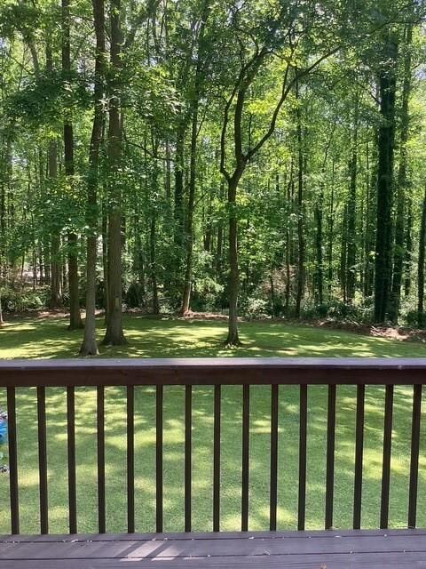 Wooden deck with a lawn