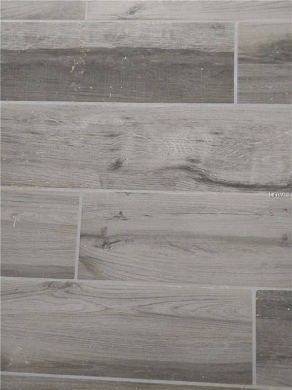 Color of the plank tile flooring throughout