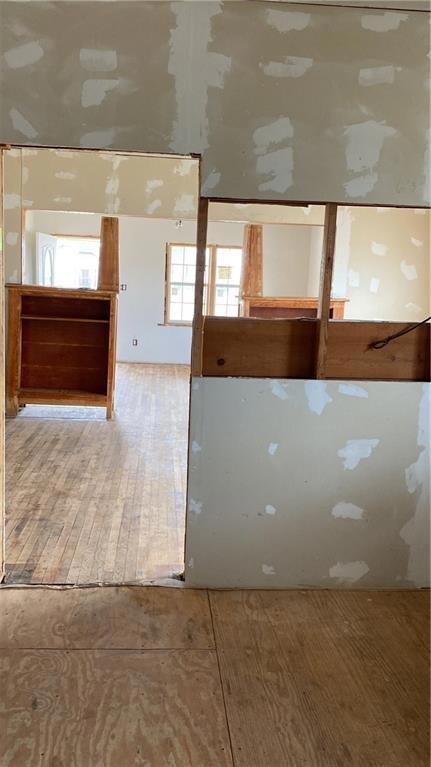 Looking from kitchen through dining room into livi